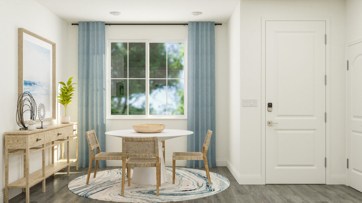 Staged rendering of furnished dining area with view of window and front entryway.