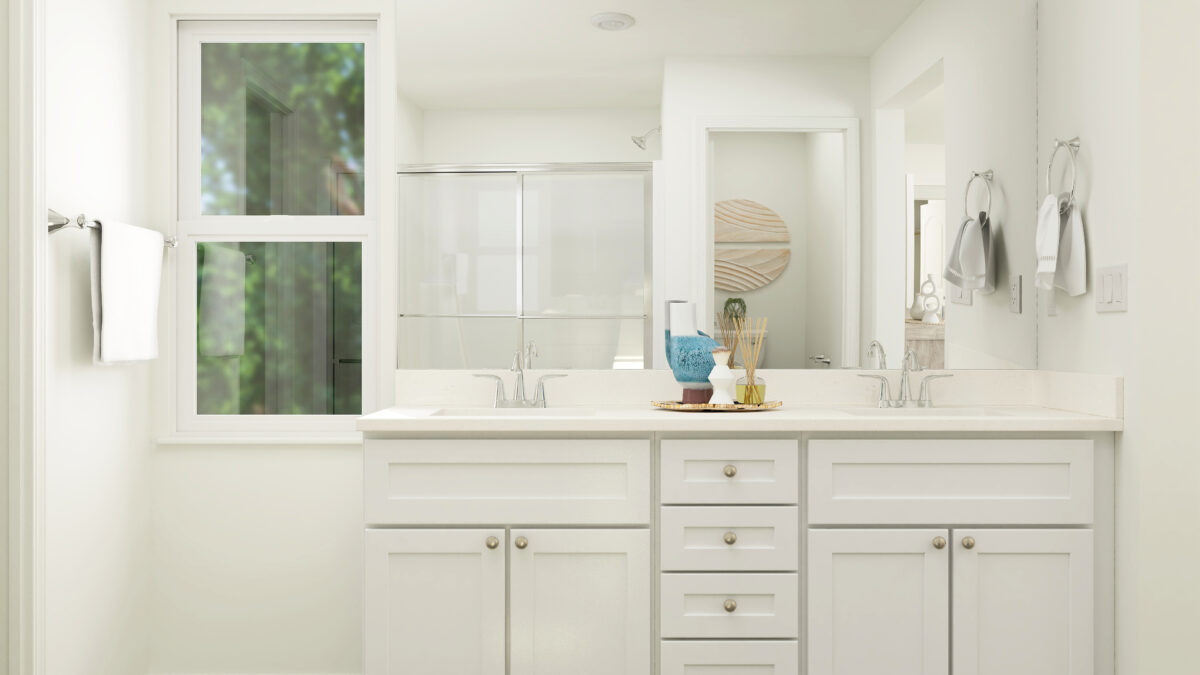 Close up of primary bathroom countertops and mirror.