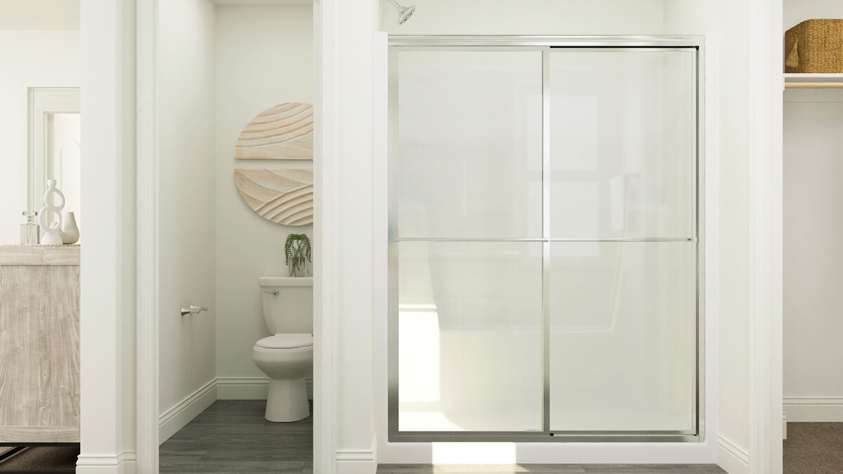 View of primary bathroom water closet and shower area.