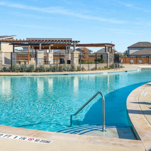 Photo of pool area, amenity center and pavilion.