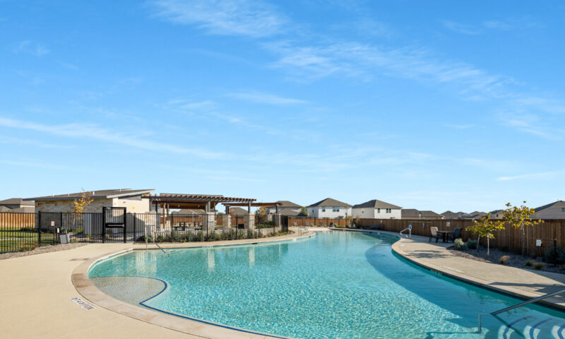 Photo of pool area, amenity center and pavilion.