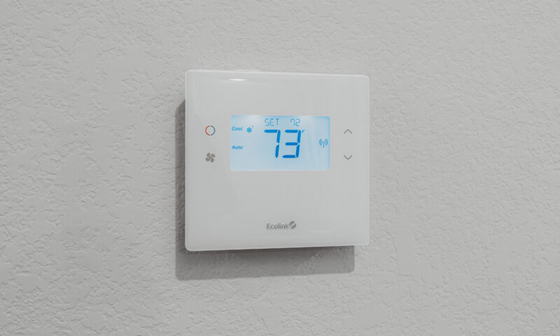 Close up of Smart home technology featuring automatic thermostat control.