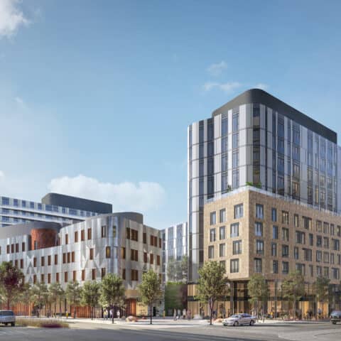 Rendering of a city block at street level showing a mix of office and residential buildings set against blue skies.