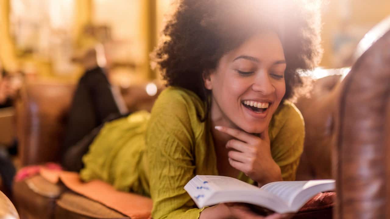 Young Woman Reading a Book