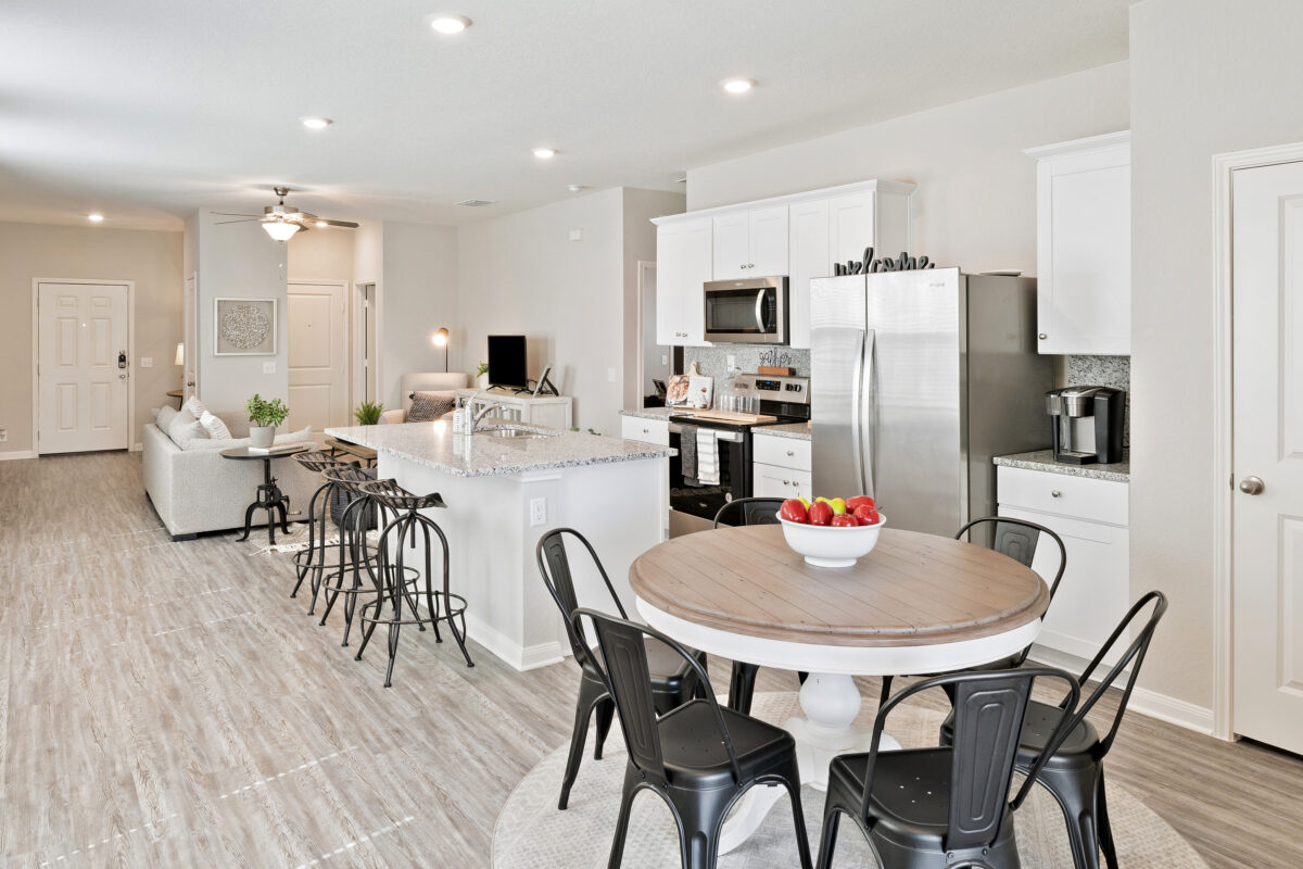 Model kitchen and dining room at Trails at Culebra