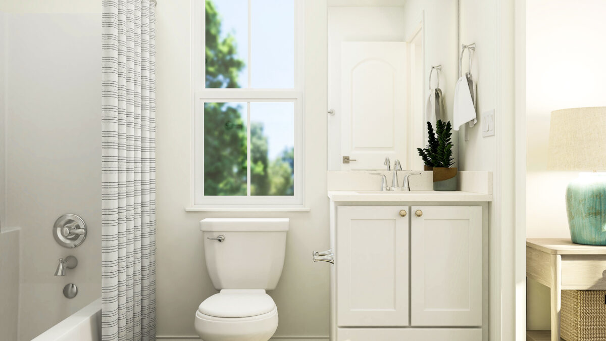 Staged rendering of secondary bathroom with view of vanity, stand-up shower and toilet.